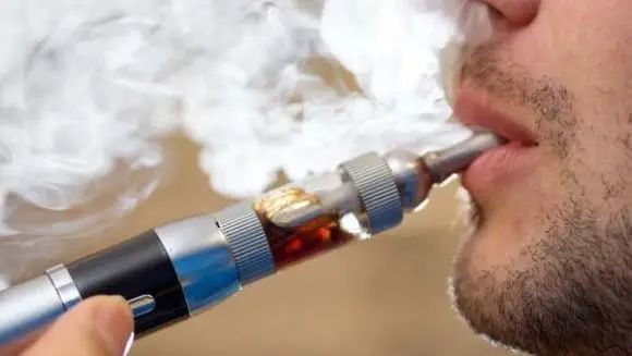 烟的伤害大还是电子烟伤害大_电子烟对人体有害吗_烟有害还是电子烟有害